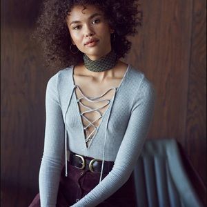 Project social ribbed lace up top in grey.