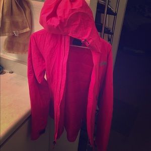 Hot pink North Face puffy coat