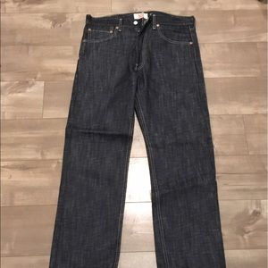 Levi's black raw denim straight leg jeans