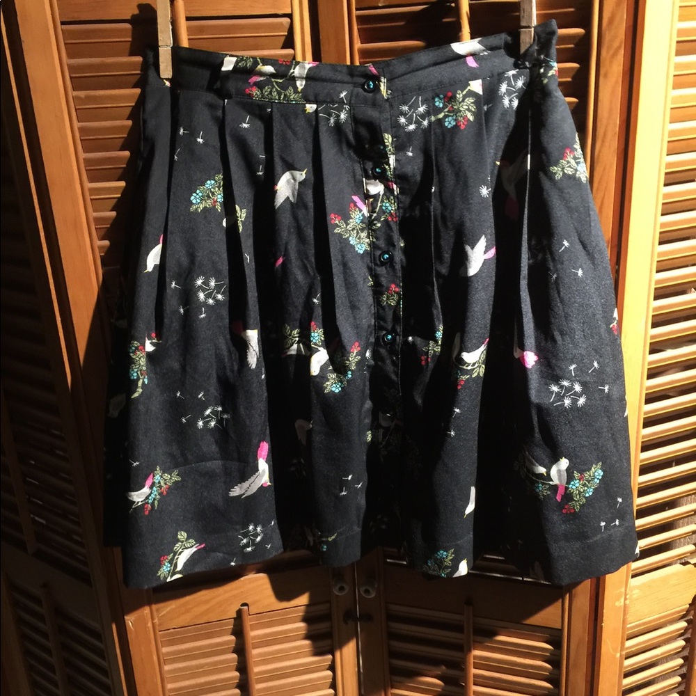 Love Fire high waisted skirt with bird print