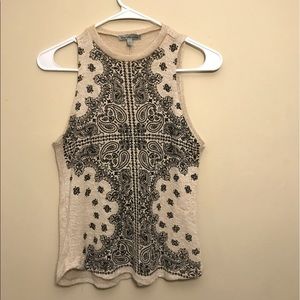 Vest style top with artistic designs