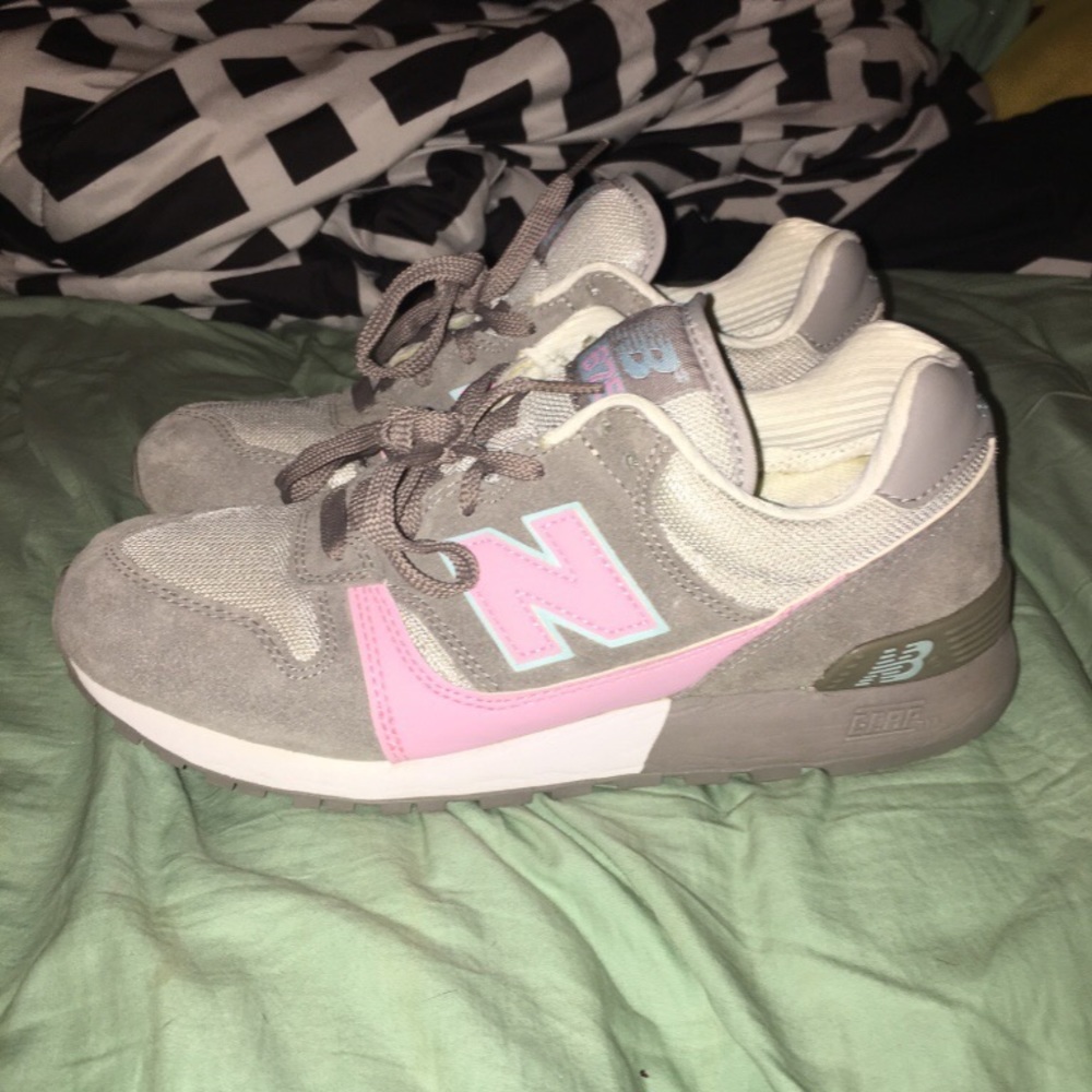 Grey and pink New Balance sneakers