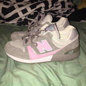 Grey and pink New Balance sneakers