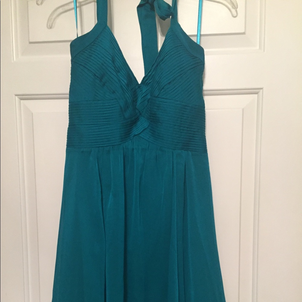 The Limited teal knee length halter dress.