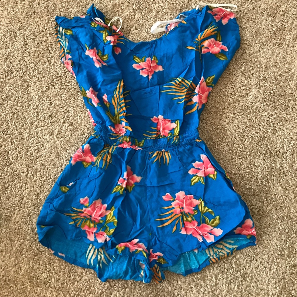 Blue floral peekaboo back Romper