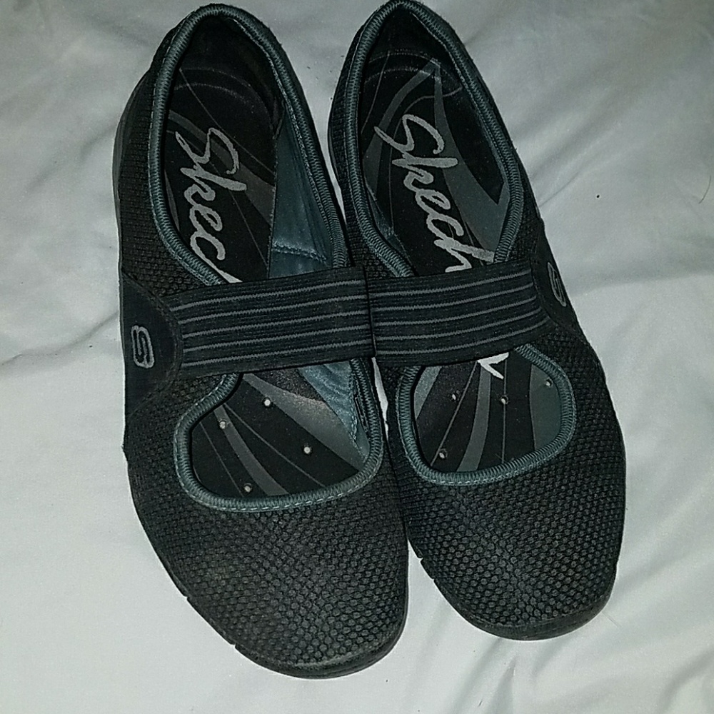 Women's slip on black Skechers Size 6