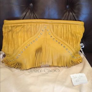 Jimmy Choo. Leather. Star studded clutch Jimmy Choo. Leather. Star studded clutch