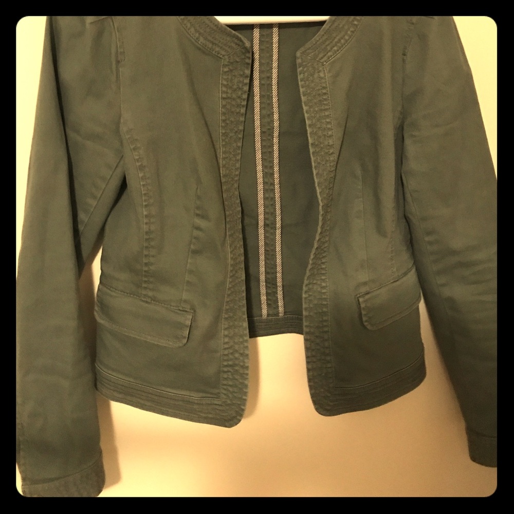 The Loft: Olive green, structured jacket.
