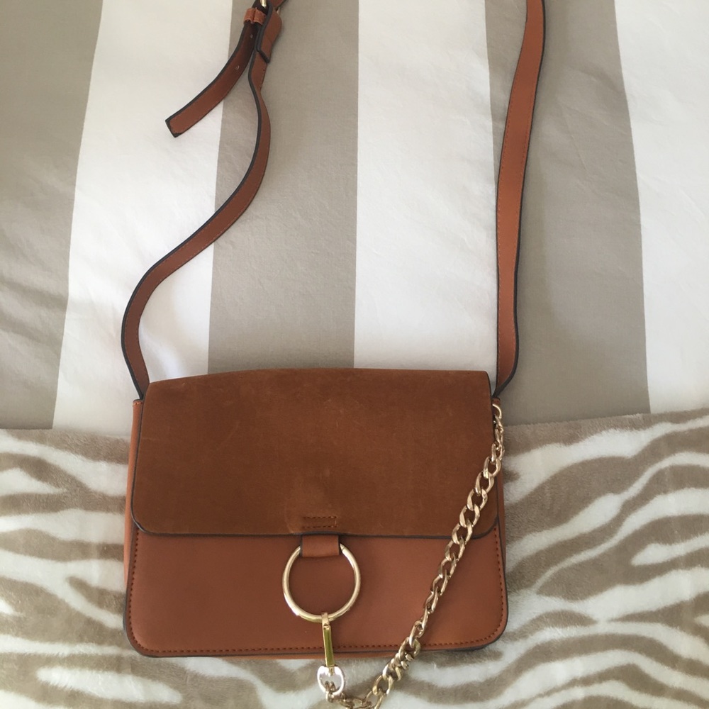 Ring detail Cross Body bag