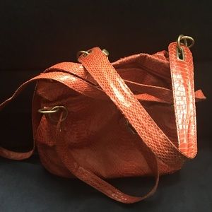 Orange cross body bag