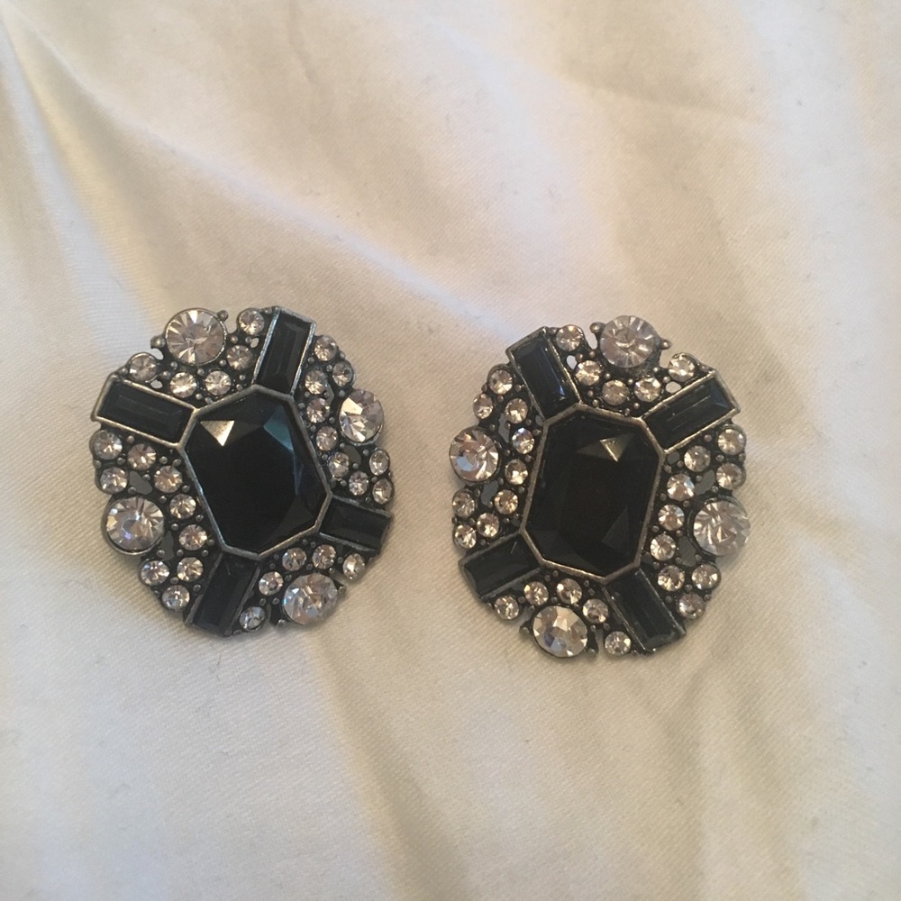 Black and silver jeweled studs.