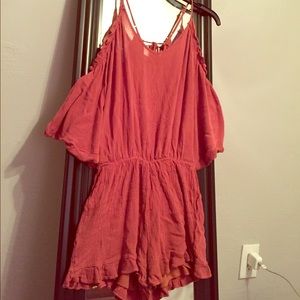 Frilly romper with deep open back 💕