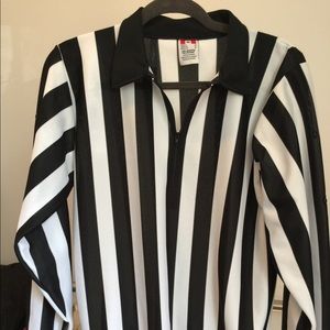 Referee black and white strips shirt.