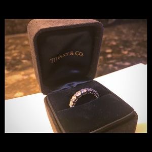 Tiffany & Co. Platinum and 7 Diamond Ring.