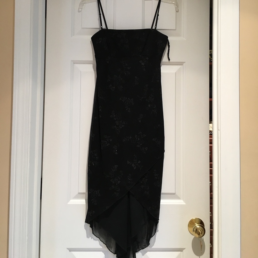Black with embellishing asymmetrical dress. Size S