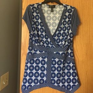 This is a INC top. It's blue & white pattern.