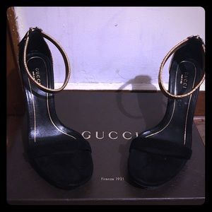 Black and gold Gucci shoes
