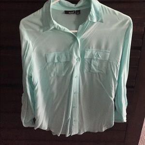 Teal button down shirt