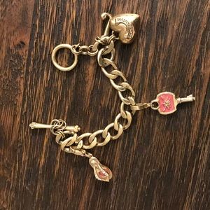 Juicy Couture Charm Bracelet with added charms Juicy Couture Charm Bracelet with added charms