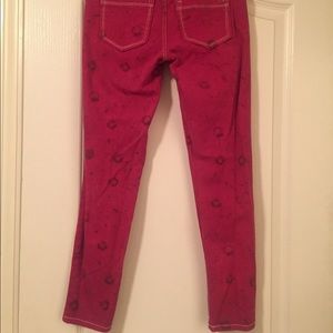 Red floral skinny jeans