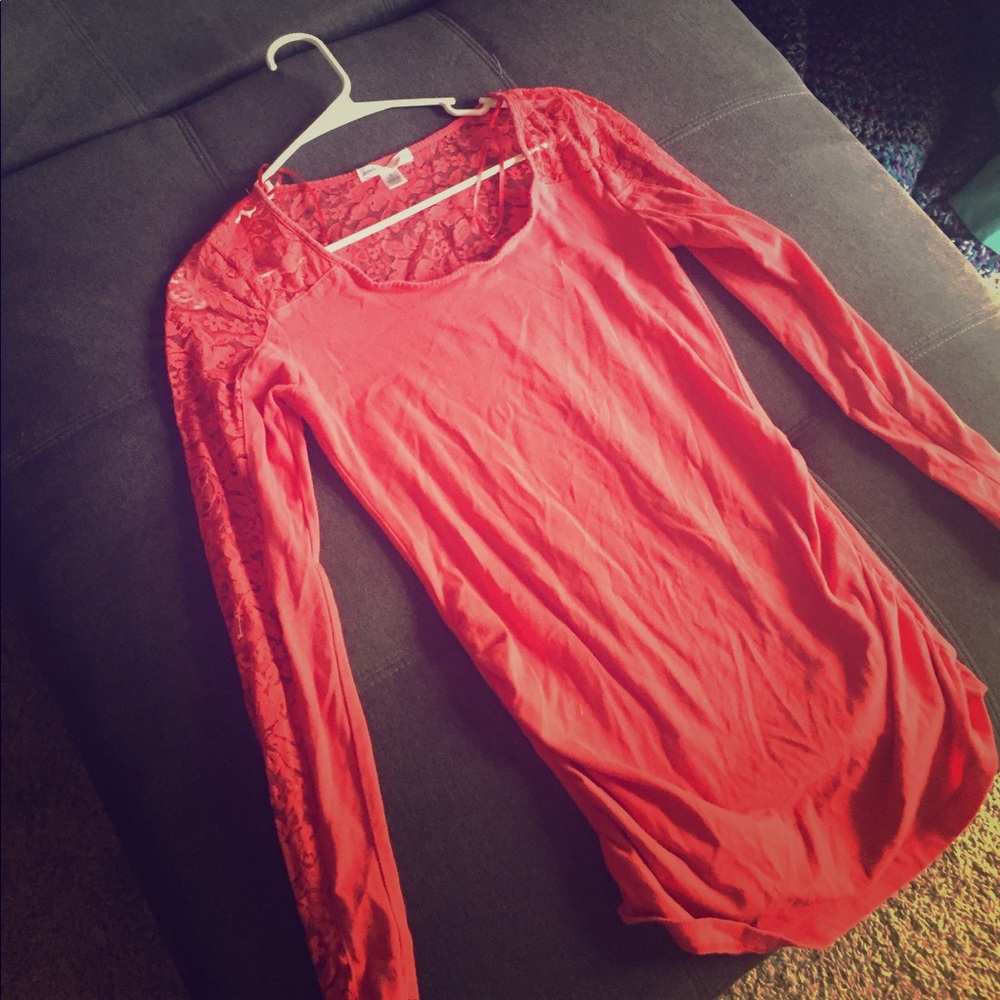 Coral lace long sleeved maternity shirt.