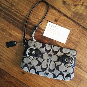 Coach silver black signature wristlet