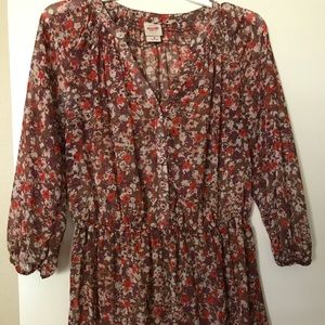 Blouse with flowers on it. Size medium.