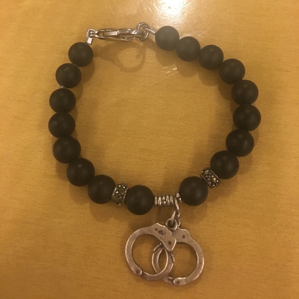 Adorable Bracelet with Dangling Handcuffs