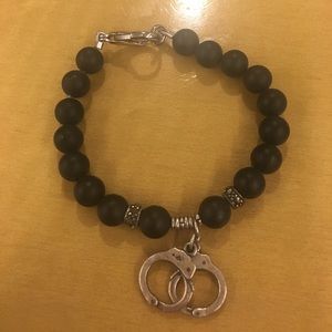 Adorable Bracelet with Dangling Handcuffs