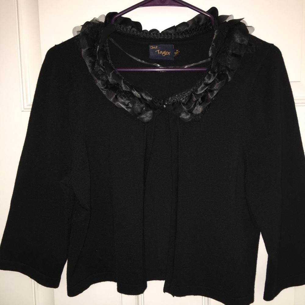 Black shrug with tulle flower neckline