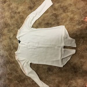 White top with gold details