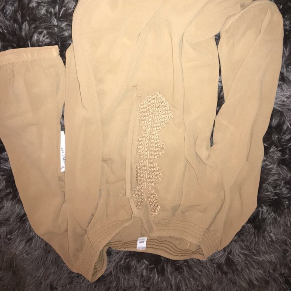 Tan shirt