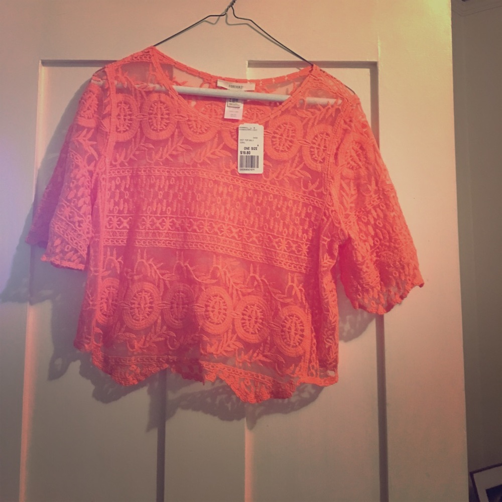 Small to medium knitted Orange Blouse. Never worn. - Picture 1 of 1