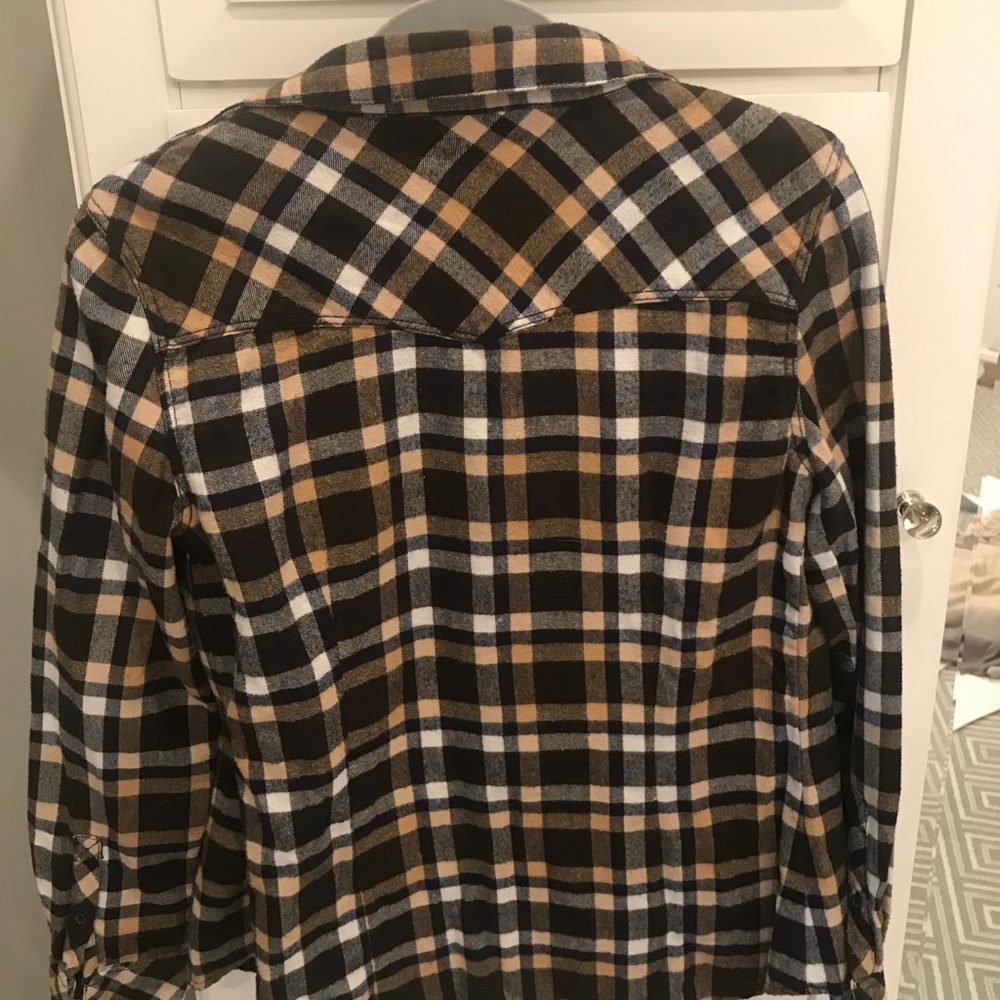 Orangish-tan and black flannel. Medium