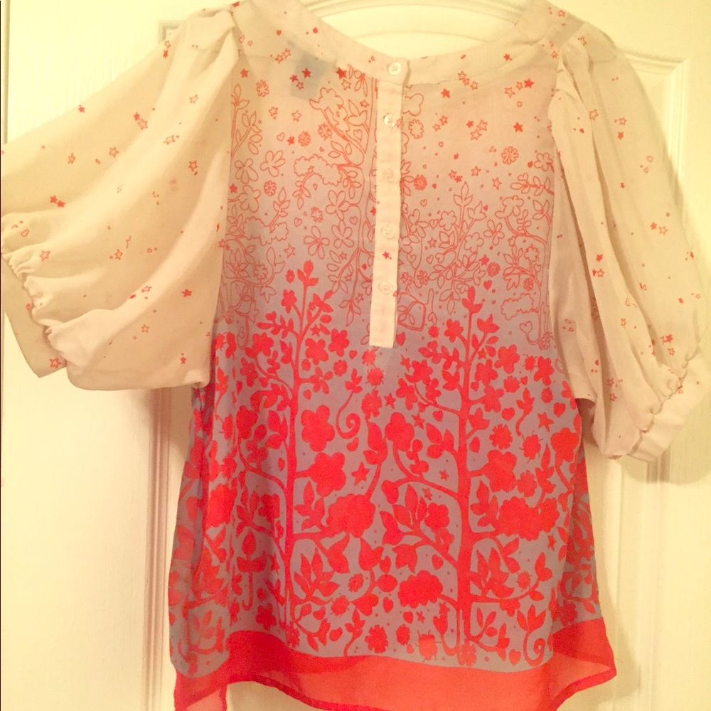 Red and white floral blouse