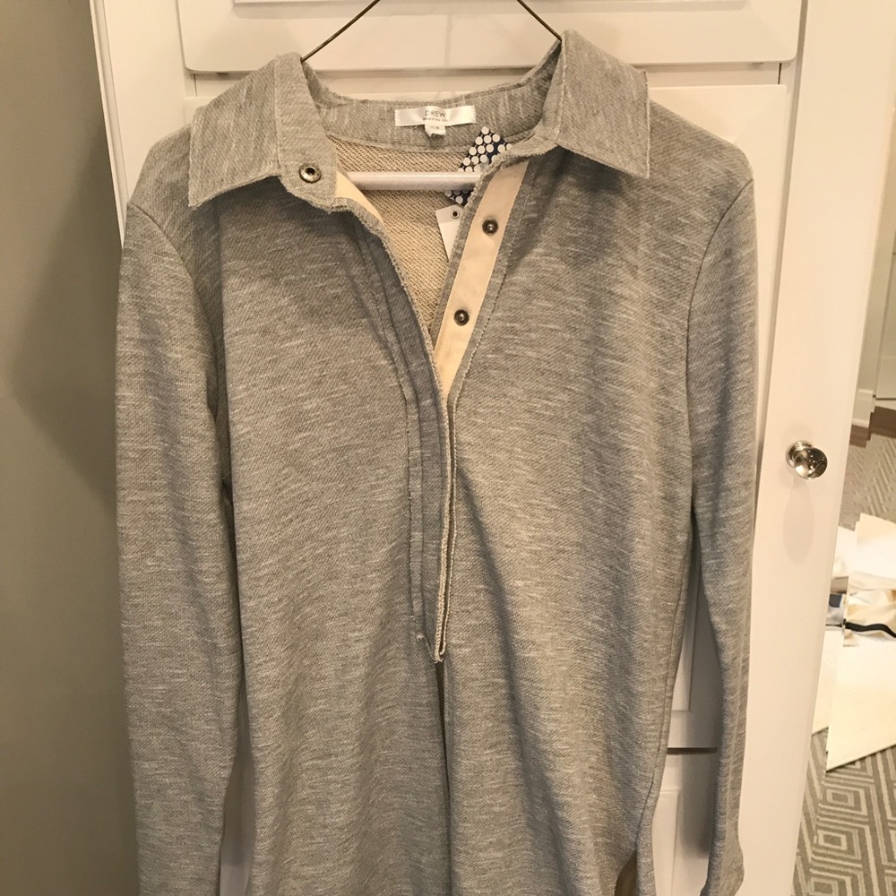 Drew, sweater, with cutout sides on the bottom.