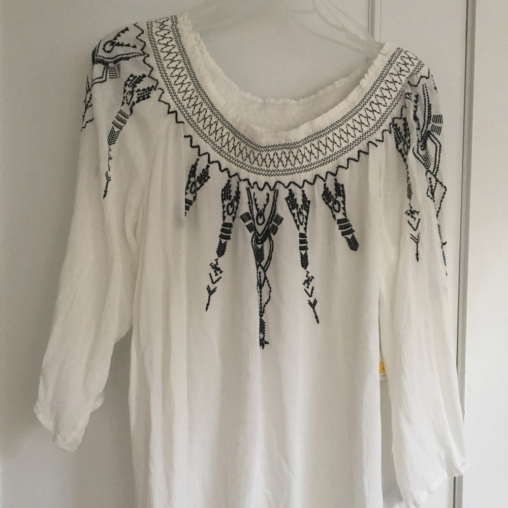 White off the shoulder top with black detailing