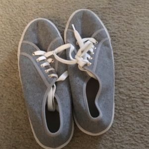 Gray shoes with tie.
