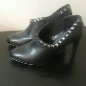 Black leather heels with studs