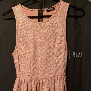 Pink with gold embellishments dress.