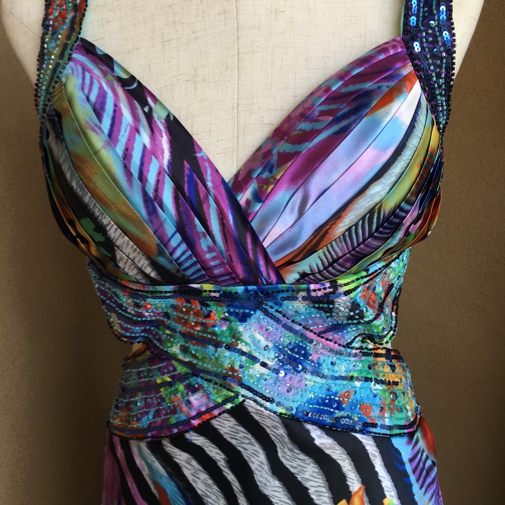 Gorgeous Low Back with sequins and Floral details.