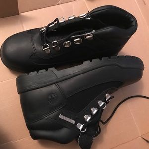 Size 4.5 all black timberlands. Never worn