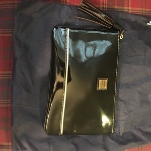 Dooney & Bourke Black Patent Leather zip clutch Dooney & Bourke Black Patent Leather zip clutch