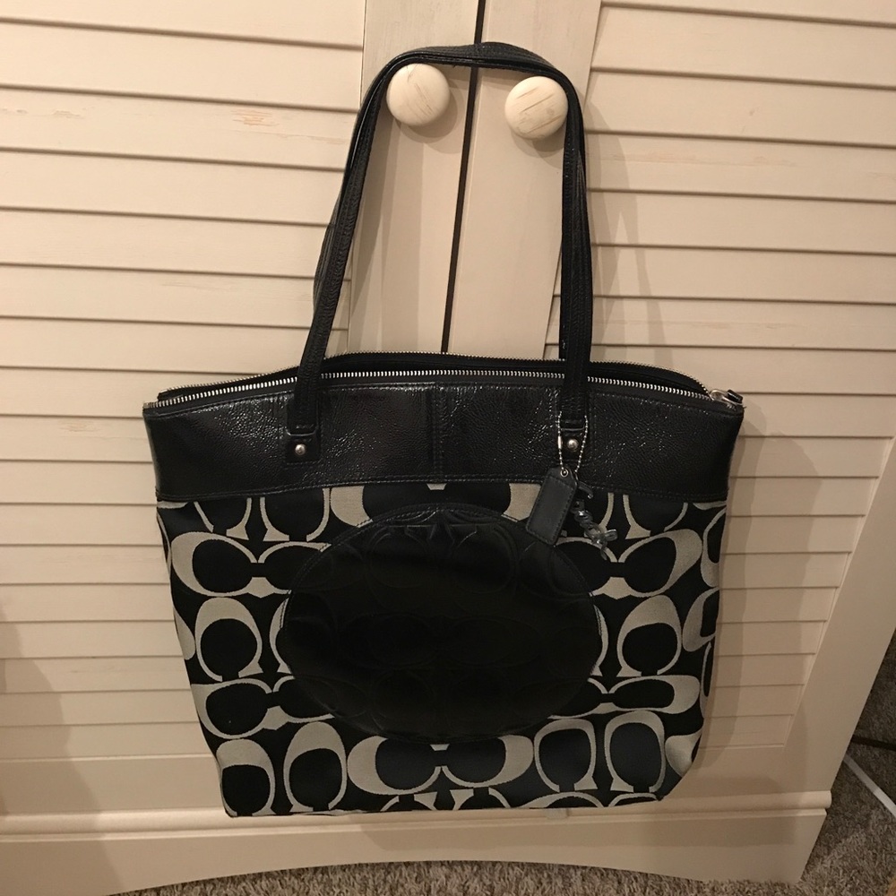 Black and gray coach purse
