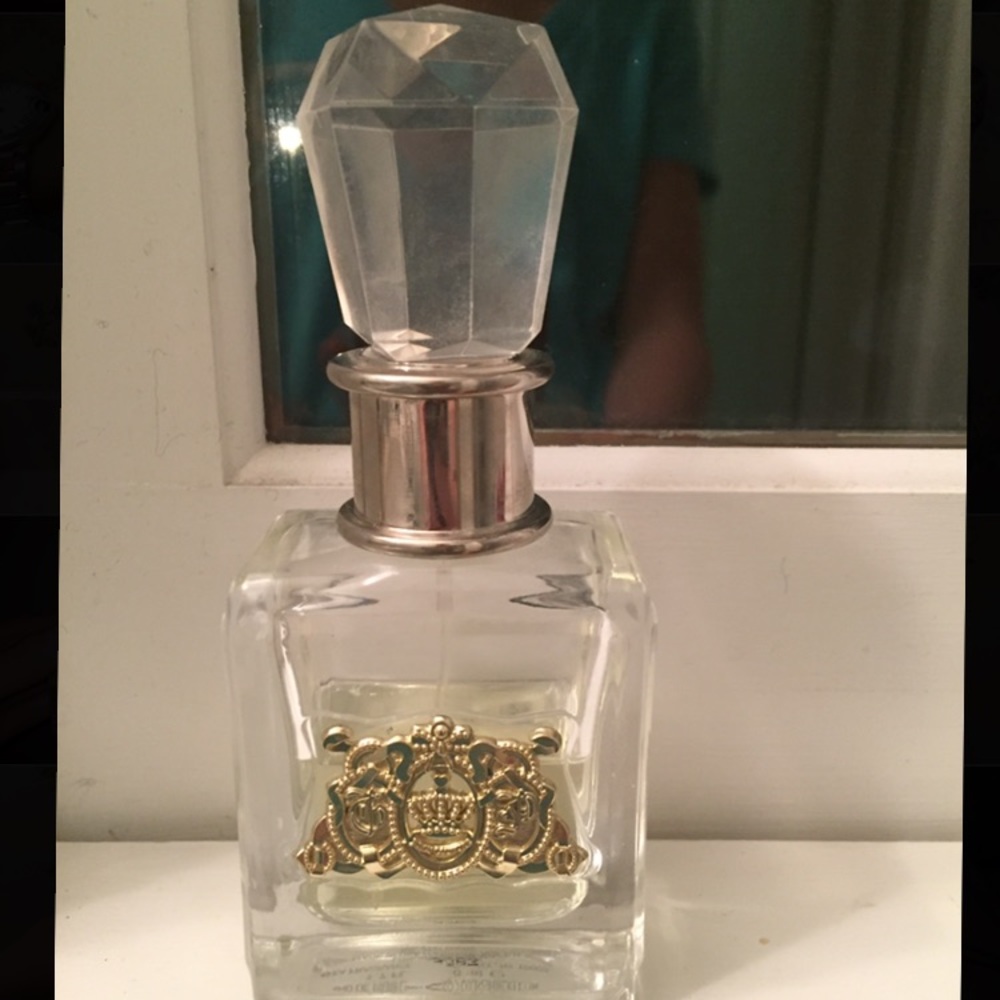 Half bottle of viva la juicy perfume