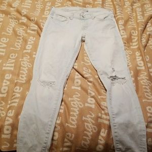 Lucky Brand distressed pale blue jeans