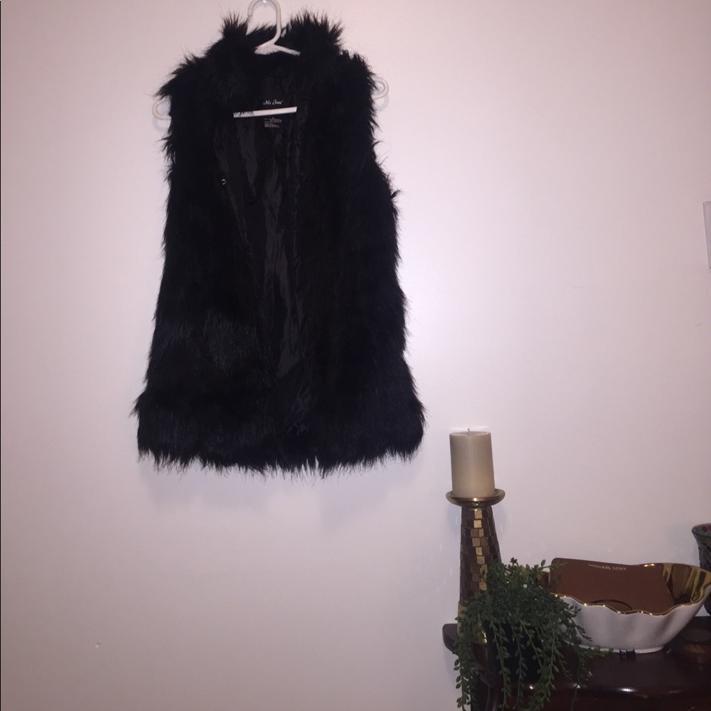 Faux fur vest with satin lining