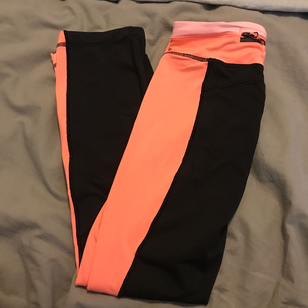 Lululemon size 4 pink/black workout pants