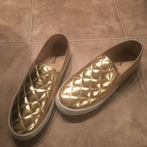 Gold slip on shoes