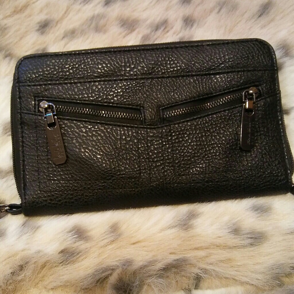 Nicole Miller black wristlet, all man made materia